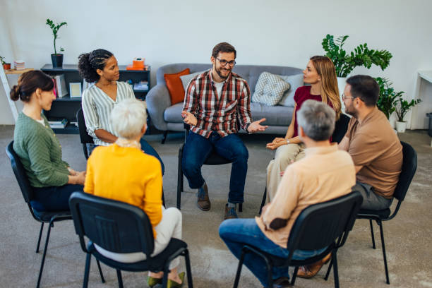group of people listening to each other about their mental health.
